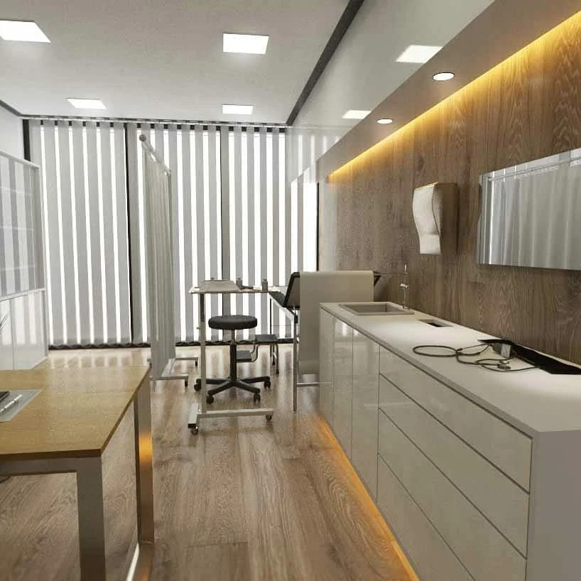 Klinikte pencere boyunca çalışma alanı ve sabit dolaplar